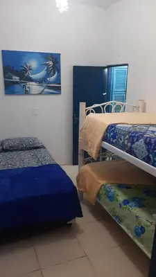 Uma cama ou camas num quarto em Hostel Green house beach