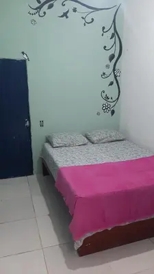 Uma cama ou camas num quarto em Hostel Green house beach