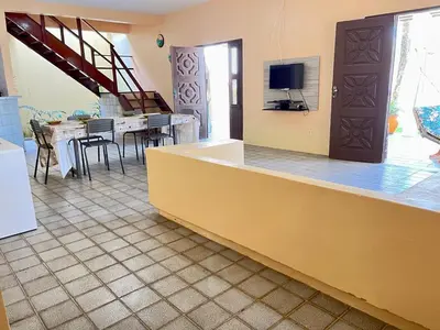 Uma televisão e/ou sistema de entretenimento em Casa de Praia Cascavel