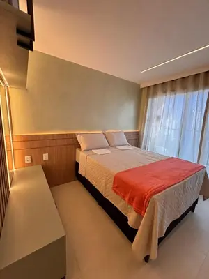 Uma cama ou camas num quarto em Studio 1412 próximo à Beira-Mar de Fortaleza-Ce