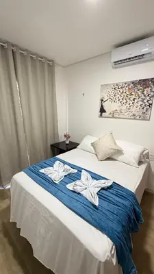 Uma cama ou camas num quarto em AP 104 com Piscina e Churrasqueira - Canoas Flecheiras