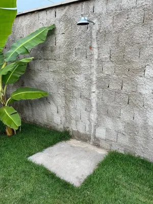 Um jardim no exterior de Casa por do sol Flecheiras
