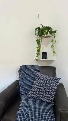 Uma área de estar em Suite Canoa Azul 2