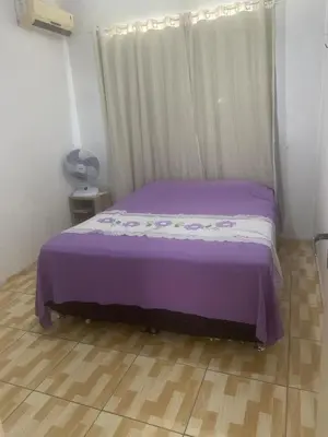 Uma cama ou camas num quarto em 3-bedroom apartment, one of them an en-suite, in Passaré