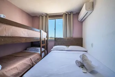 Uma cama ou camas num quarto em Mirante #506 - Praia do Futuro por Carpediem