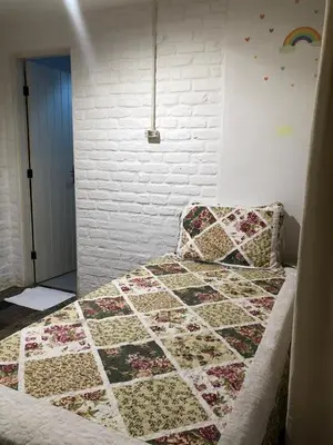 Uma cama ou camas num quarto em Paraíso da Barra House