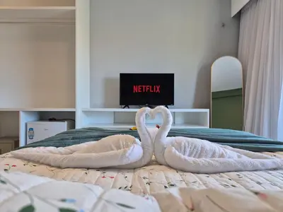 Uma cama ou camas num quarto em Cobertura Duplex - Luxo com Jacuzzi e 3 Suítes