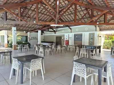 Um restaurante ou outro lugar para comer em Cobertura Duplex - Luxo com Jacuzzi e 3 Suítes
