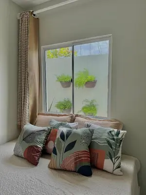 Uma cama ou camas num quarto em Pousada Flor do Sol