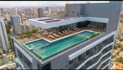 A piscina em ou perto de Apto 2 quartos luxuoso a poucos metros da Beira Mar