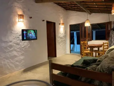 Uma televisão e/ou sistema de entretenimento em Casa Mar Redonda - Icapuí
