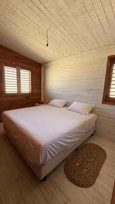 Uma cama ou camas num quarto em Casa Gemini