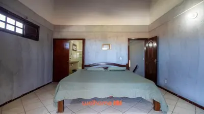 Uma cama ou camas num quarto em Casa em Aquiraz com Piscina 10 min do Beach Park