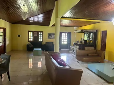 Uma área de estar em Casa fazenda Paracuru