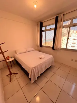 Uma cama ou camas num quarto em Apto 2 quartos na Beira Mar