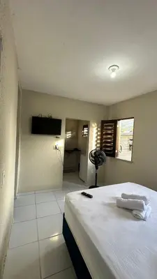 Uma cama ou camas num quarto em Garden Flat Beach - 202