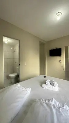 Uma cama ou camas num quarto em Garden Flat Beach - 202