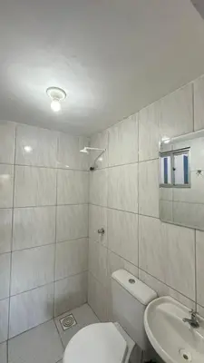 Uma casa de banho em Garden Flat Beach - 202
