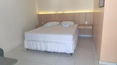 Uma cama ou camas num quarto em Pousada Use Sabor Caseiro
