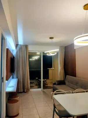 Uma área de estar em Apartamento à beira-mar na Praia do Futuro