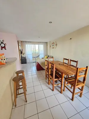 Uma área de estar em Apartamento na Praia do Futuro a 150m da Praia Mobiliado