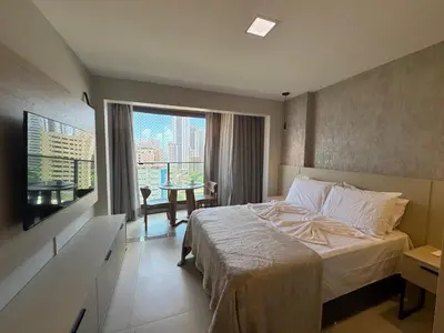 Uma cama ou camas num quarto em Beach Class Meireles - Apto de luxo