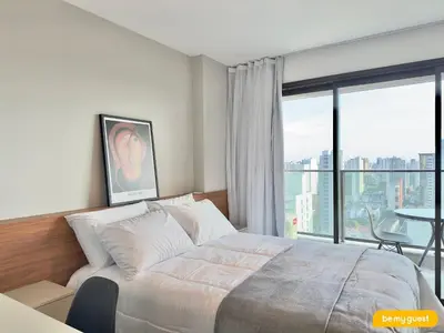 Uma cama ou camas num quarto em Beach Class Meireles