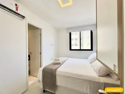 Uma cama ou camas num quarto em JSmart Dom