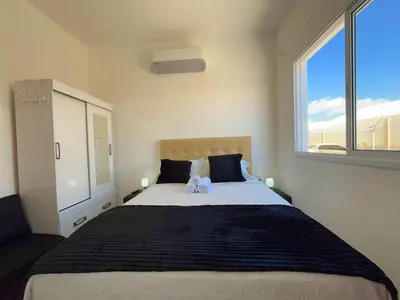Uma cama ou camas num quarto em Canoa quebrada - Apartamento a 4 minutos da Praia