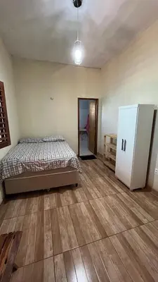Uma cama ou camas num quarto em Encanto de paracuru