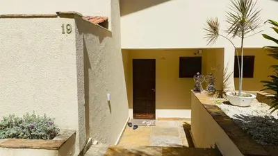 Um jardim no exterior de Casa em condominio proximo ao beach park