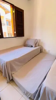 Uma cama ou camas num quarto em Casa em condominio proximo ao beach park