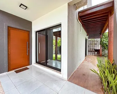 Uma cama ou camas num quarto em Casa Moderna & Conforto