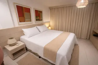 Uma cama ou camas num quarto em TerraMaris - Duplex, 5 qtos, jacuzzi