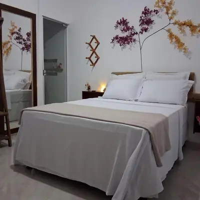 Uma cama ou camas num quarto em Preá, Suíte Privativa próximo ao Parque Nacional de Jeri