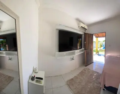 Uma televisão e/ou sistema de entretenimento em Casa Amarela Caponga