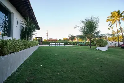Um jardim no exterior de Casa para temporada cumbuco
