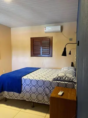 Uma cama ou camas num quarto em Casa em Moitas