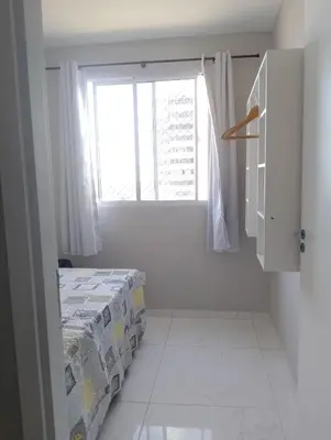 Uma cama ou camas num quarto em Apê Pé na Areia com Vista Mar Ar-condicionado & Garagem