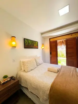 Uma cama ou camas num quarto em Suite Individual com AR e WI-FI Casa Full Hausi