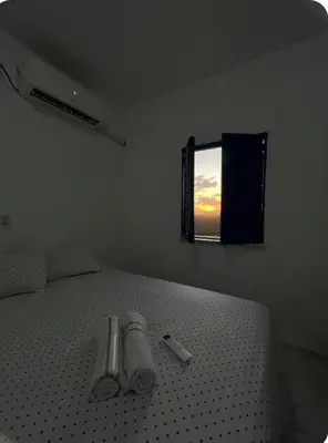 Uma cama ou camas num quarto em Apartamento da Kenia