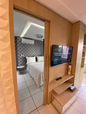 Uma cama ou camas num quarto em APARTAMENTO 17º Andar Beira Mar com 2 QUARTOS