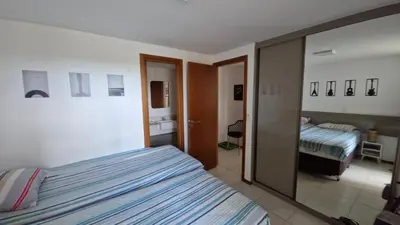 Uma cama ou camas num quarto em Catu Lake Residence