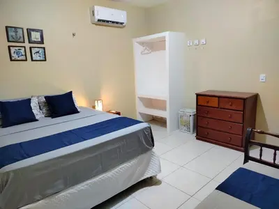 Uma cama ou camas num quarto em Casa Fortim - Fortim Haus