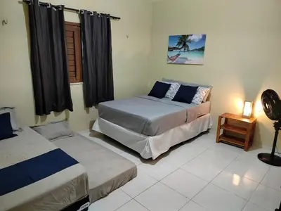 Uma cama ou camas num quarto em Casa Fortim - Fortim Haus