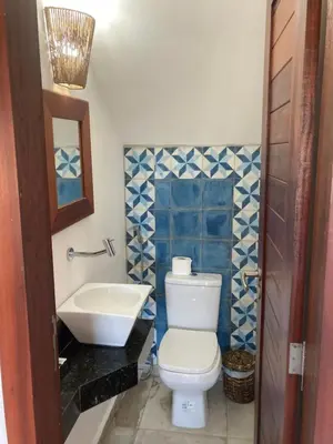 Uma casa de banho em Casa Encanto dos Corais