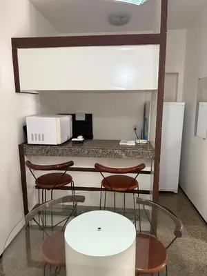 A cozinha ou kitchenette de Villa Costeira Flat