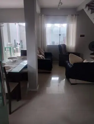 Uma área de estar em Aconchego Paracuru