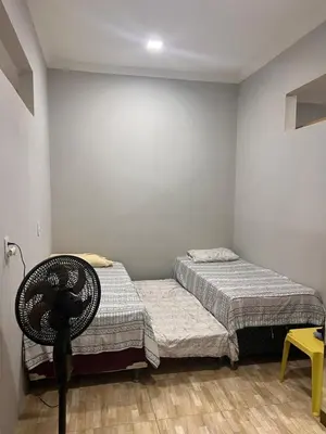 Uma cama ou camas num quarto em Aconchego Paracuru