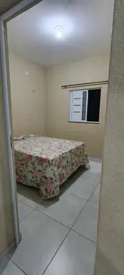 Uma cama ou camas num quarto em Casa do paraíso